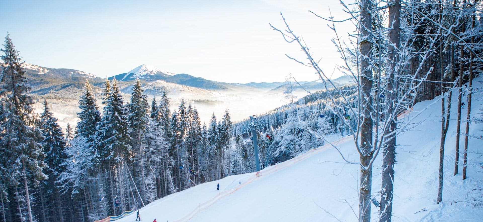 Snow-capped mountain peaks at golden hour
